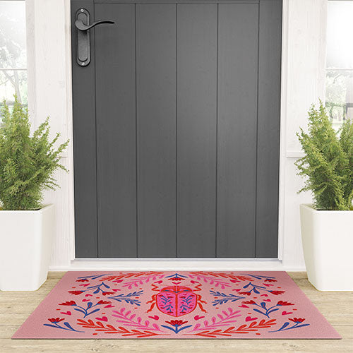 Angela Minca Lovebug pink and red Welcome Mat